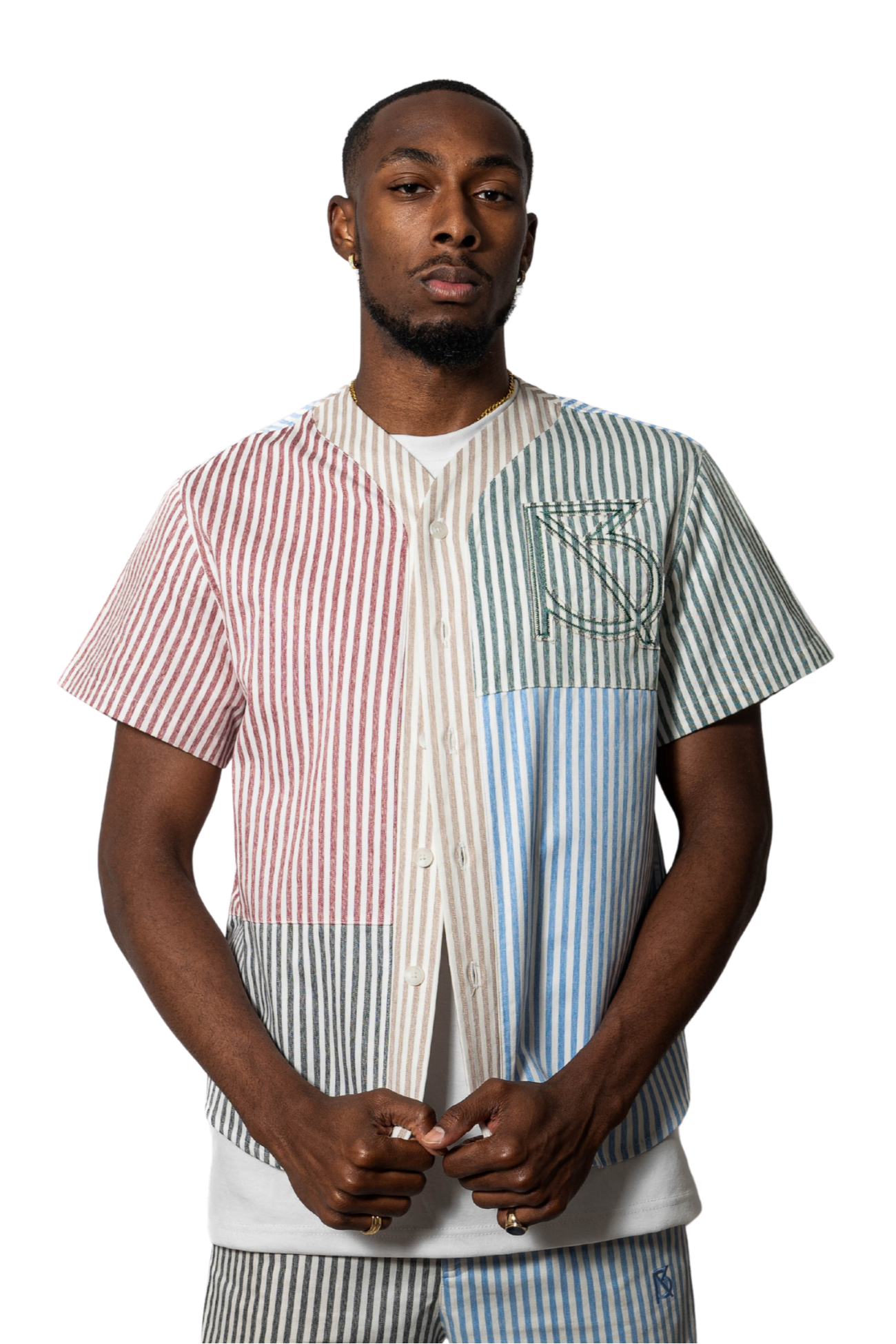Model wearing a colorful striped shirt