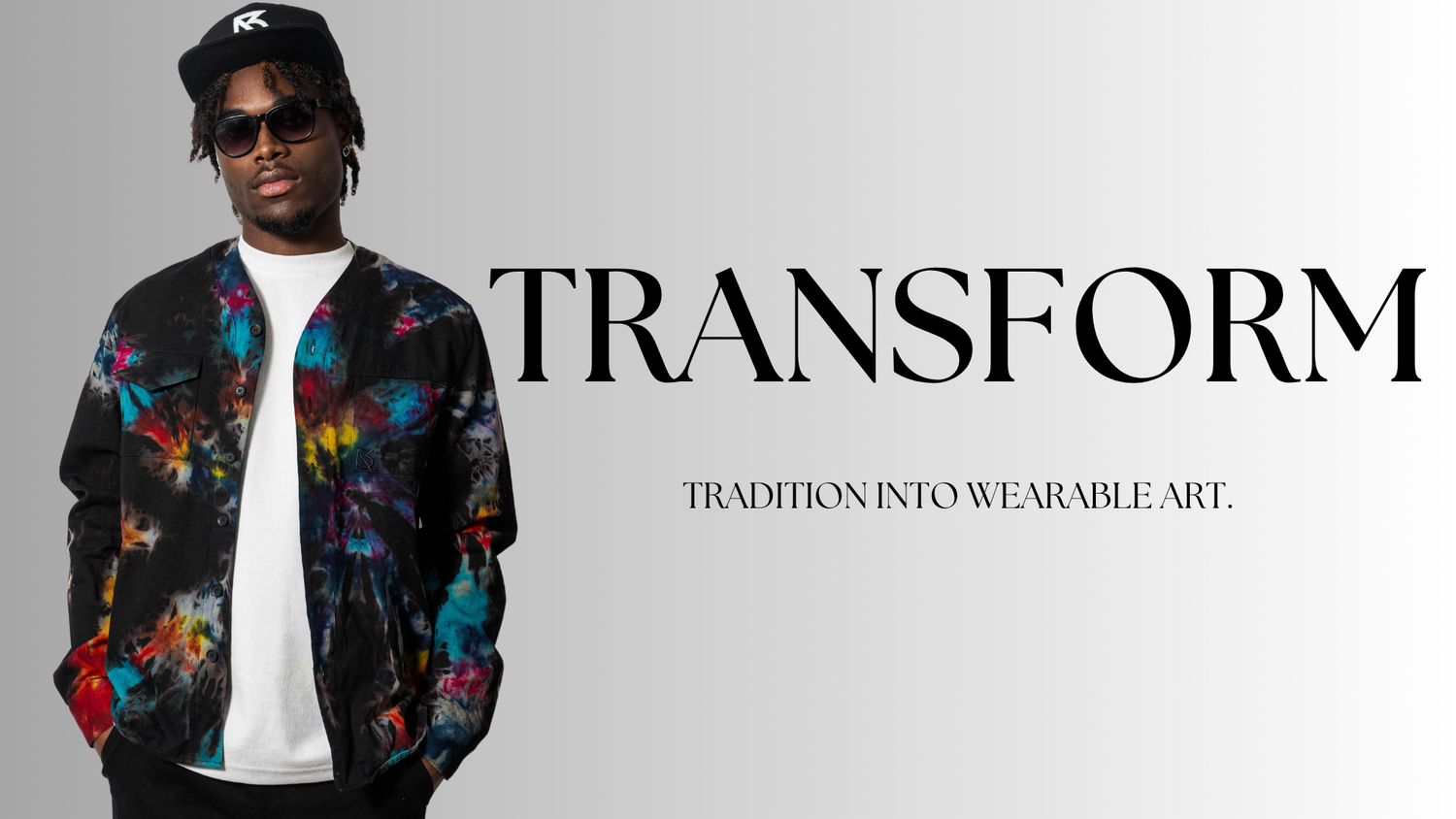 Model wearing a Black Tie-Dye Herman V-Neck Brian Americus button up shirt styled in a unique way, symbolizing personal and sartorial transformation.
