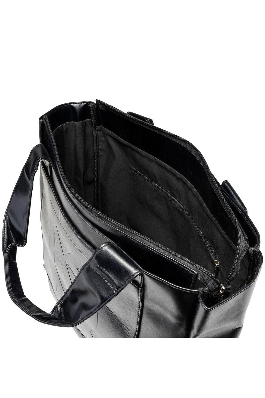 Interior view of the Minoso Faux Leather Tote Bag, showing roomy compartments and premium faux leather finish.